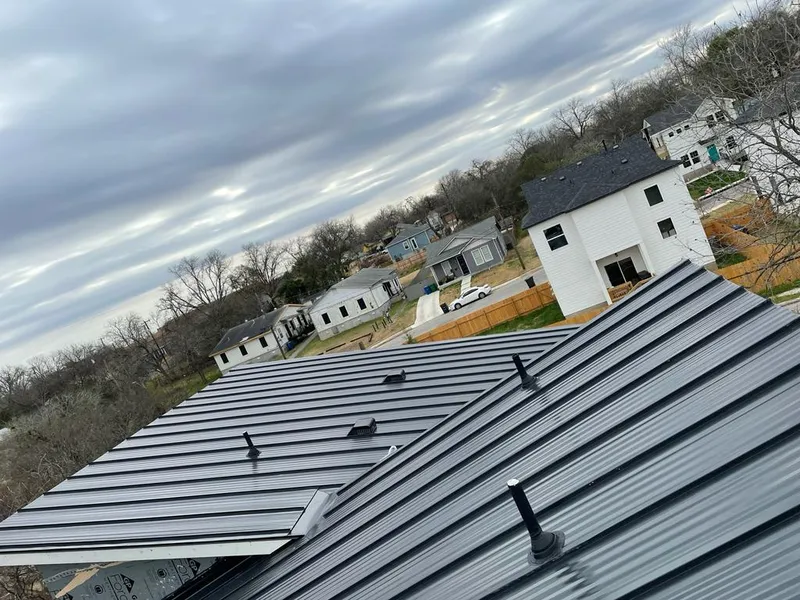 Standing seam metal roof panels with vents for Skylight Repair in Douglass Hills